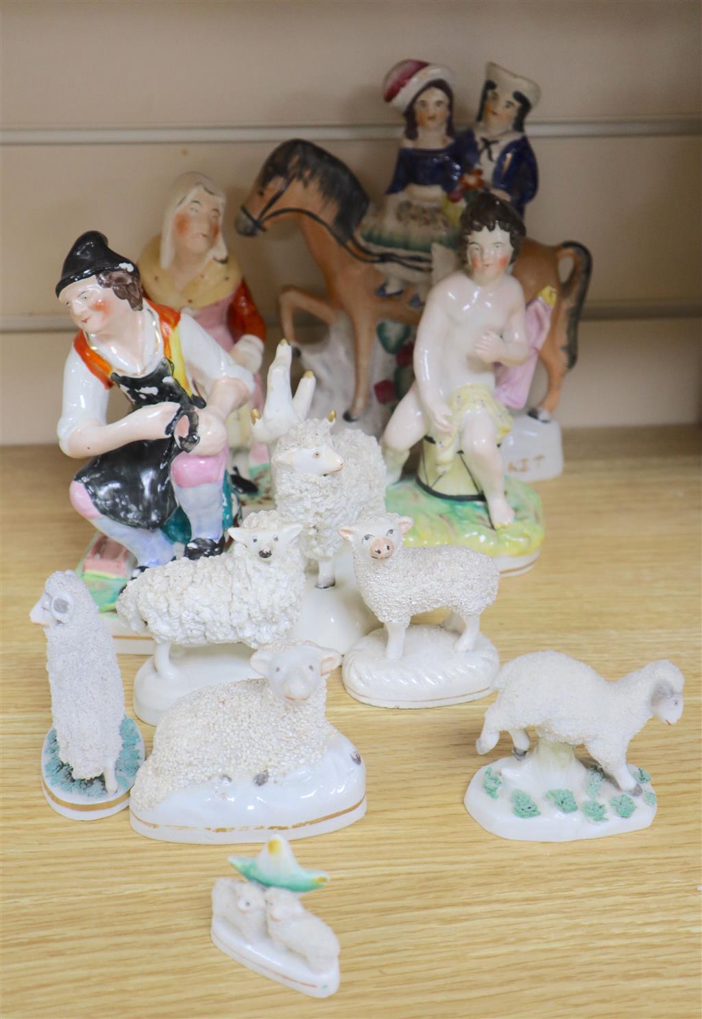 A group of Staffordshire figures and animals